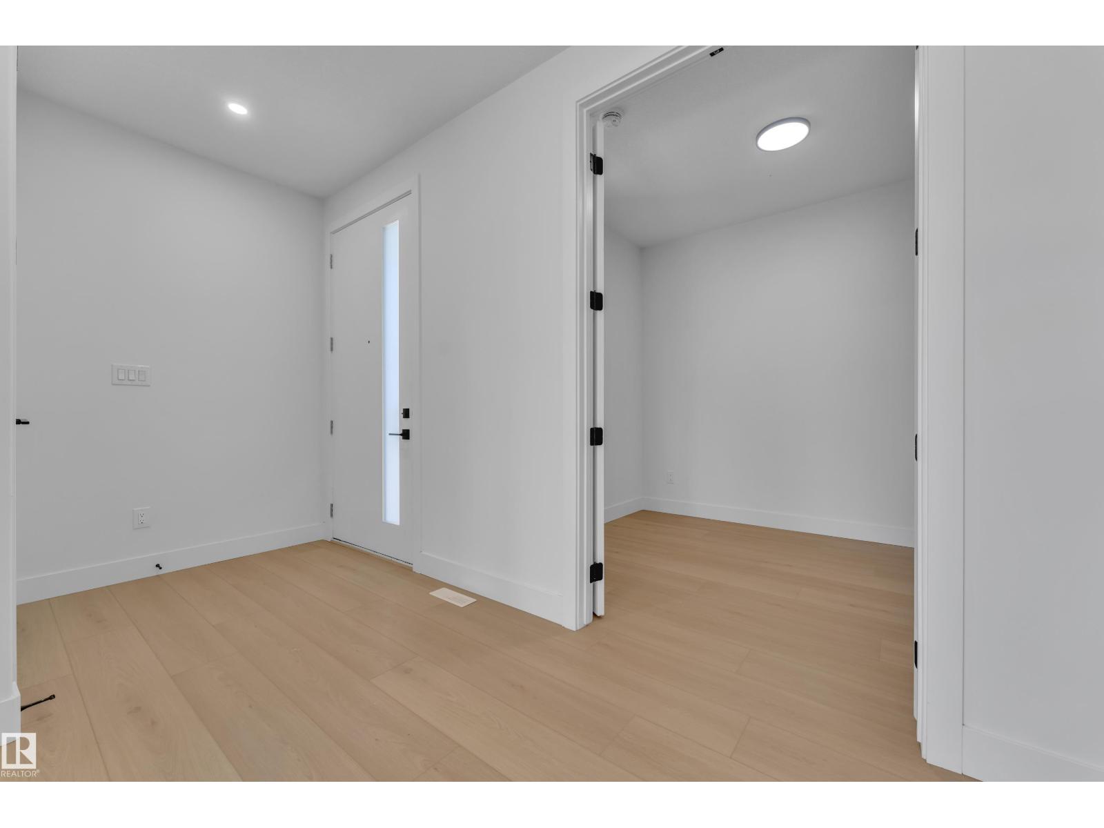 Front entryway with wood flooring